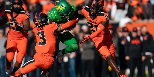 Oregon State Beavers defensive back Jaydon Grant #3 makes a tackle during the first half of the game against the Oregon Ducks at Reser Stadium on November 26, 2022 in Corvallis, Oregon. 