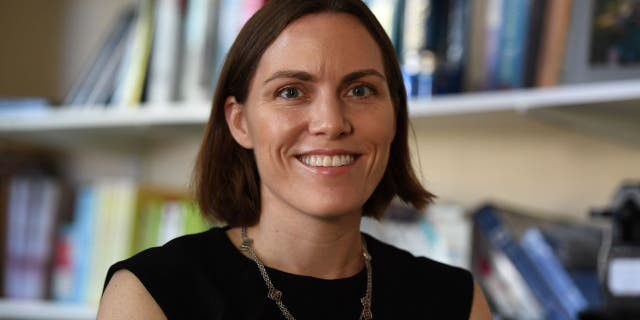 Professor Emily Oster poses for a portrait at her office at Brown University May 21, 2018, in Providence, Rhode Island.