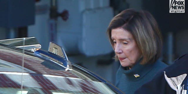 Nancy Pelosi leaves her home via the garage on Thursday, Nov. 3, 2022.