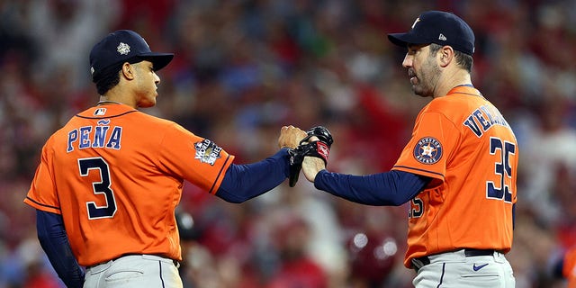 Jeremy Pena #3 and Justin Verlander #35 of the Houston Astros celebrate after hitting against the Philadelphia Phillies during the fourth inning of Game 5 of the 2022 World Series at Citizens Bank Park on November 3, 2022 in Philadelphia, Pennsylvania.