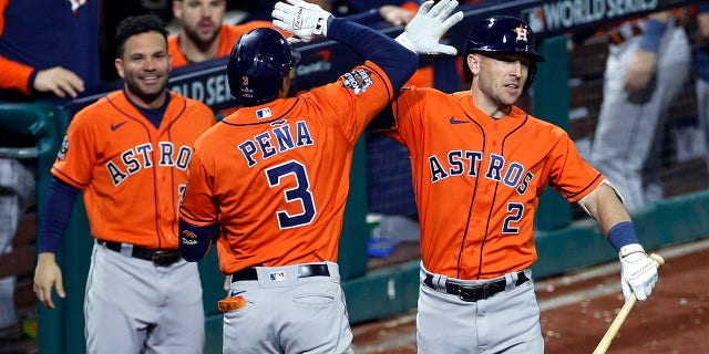 Jeremy Pena #3 of the Houston Astros celebrates with teammate Alex Bregman #2 after hitting a home run against the Philadelphia Phillies during the fourth inning in Game Five of the 2022 World Series at Citizens Bank Park on November 03, 2022 in Philadelphia, Pennsylvania.