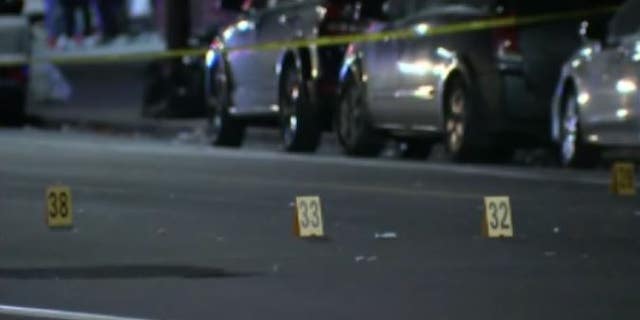 Police said at least 40 evidence markers were placed at a mass shooting scene outside a bar in Philadelphia, Pa.