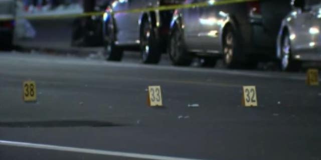 Police said at least 40 evidence markers were placed at a mass shooting scene outside a bar in Philadelphia, Pa.