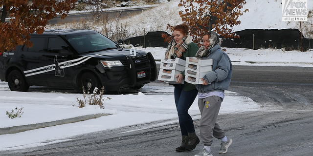 Students at the University of Idaho and a local pizza place worker delivered pizza to the Moscow Police Department.