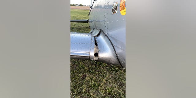 The wing of the DHC-1 Chipmunk plane after it crashed into a radio antenna can be seen out of place.