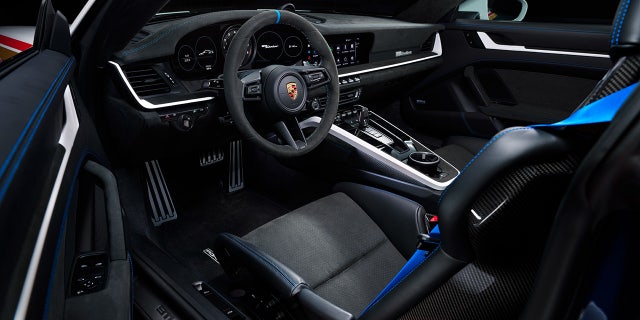 The 911 Dakar cabin features aggressive sport bucket seats and deleted rear seats.