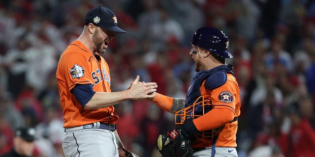 Ryan Pressly and Christian Vazquez of the Houston Astros celebrate a combined no-hitter to defeat the Phillies 5-0 in Game 4 of the World Series on Nov. 2, 2022, in Philadelphia.