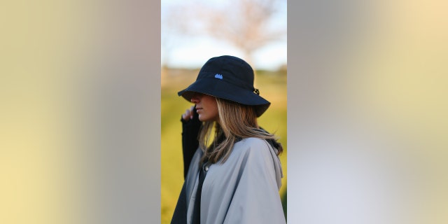 Help her stay dry while still looking stylish with this Raincap by Rainrap.