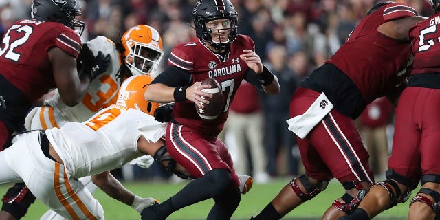 Spencer Rattler has a career night as South Carolina manages to dominate against No. 5 Tennessee 2 South Carolina quarterback Spencer Rattler (7) drives past Tennessee defensive lineman Tyler Baron (9) during the first half of an NCAA college football game Saturday, May 19 November 2022, in Columbia, South Carolina.