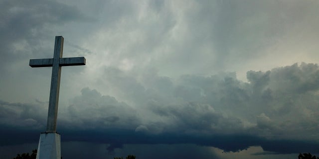 A recent poll has found that 80% of religious Americans feel a stewardship to the Earth and that God tasked humans with protecting it. Pictured: A cross outside a church in Mequon, Wis., on Aug. 2, 2020.