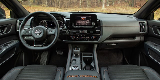 The interior features unique upholstery and Rock Creek badging.