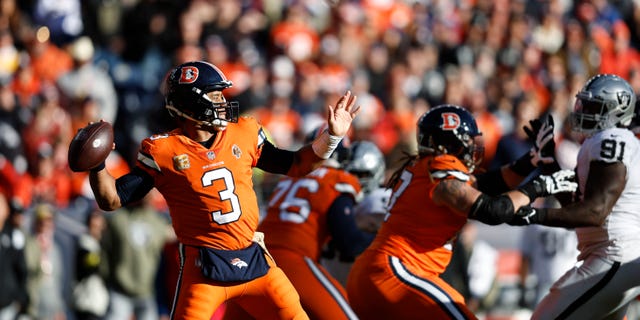 Russell Wilson, #3 of the Denver Broncos, passes during an NFL game between the Las Vegas Raiders and Denver Broncos at Empower Field At Mile High on Nov. 20, 2022 in Denver.