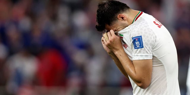 Saeid Ezatolahi of Iran looks dejected after a Group B match between Iran and the United States at the 2022 FIFA World Cup at Al Thumama Stadium in Doha, Qatar, Nov. 29, 2022.