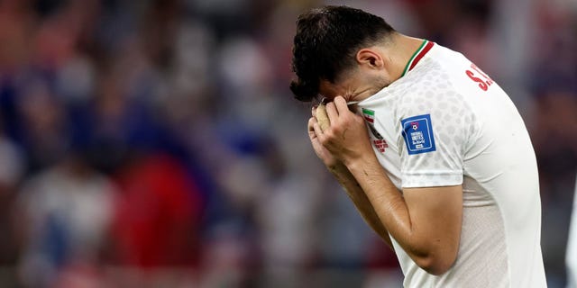 Saeid Ezatolahi of Iran looks dejected after a Group B match between Iran and the United States at the 2022 FIFA World Cup at Al Thumama Stadium in Doha, Qatar on November 29, 2022.