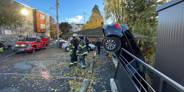 Seattle fire officials said the boy was rescued and unharmed following the crash.