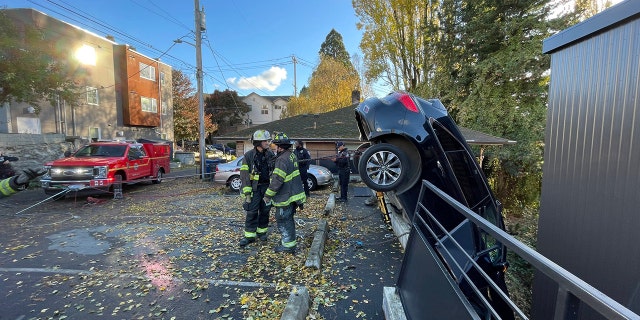 Seattle fire officials said the boy was rescued and unharmed following the crash.