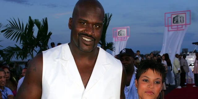 Shaquille O'Neal and his wife Shaunie during the 2004 MTV Video Music Awards red carpet at the American Airlines Arena in Miami, Florida.