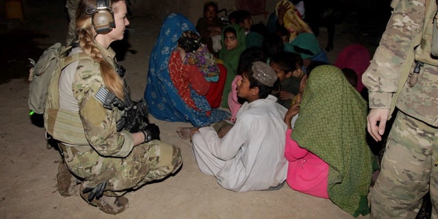 Etchison serves in Afghanistan with the Cultural Support team, searching and questioning women and children to gather intelligence on high-value Taliban and al-Qaeda targets. 