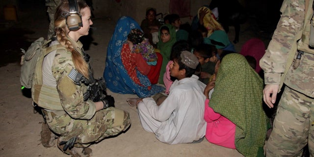 Etchison serves in Afghanistan with the Cultural Support team, searching and questioning women and children to gather intelligence on high-value Taliban and al-Qaeda targets. 