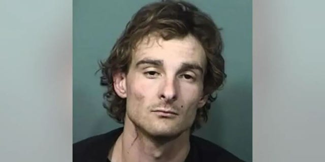 Zachary Sibert was arrested after he allegedly ran across the freeway from sheriff's deputies and hid in another vehicle.