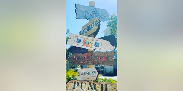 See here are 6 directional signs at The all-inclusive Margaritaville Island Reserve Cap Cana in the Dominican Republic.