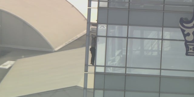 A man climbed the side of The Ritz-Carlton in downtown Los Angeles on Tuesday. He was arrested when he got to the top.