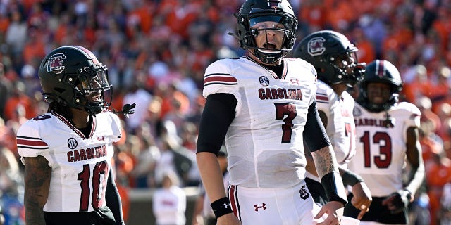 Spencer Rattler, number 7 of the South Carolina Gamecocks, celebrates a second quarter touchdown against the Clemson Tigers at Memorial Stadium on November 26, 2022 in Clemson, South Carolina. 