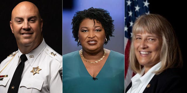 From left, Barrow County (Ga.) Sheriff Jud Smith, Stacey Abrams, and Jackson County (Ga.) Sheriff Janis Mangum.