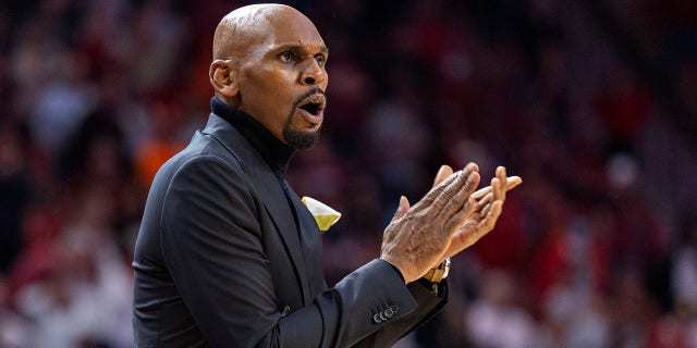 Vanderbilt Commodores head coach Jerry Stackhouse cheers on his team during the second half against the Arkansas Razorbacks at Bud Walton Arena on January 4, 2022 in Fayetteville, Arkansas. The Commodores defeated the Razorbacks 75-74.