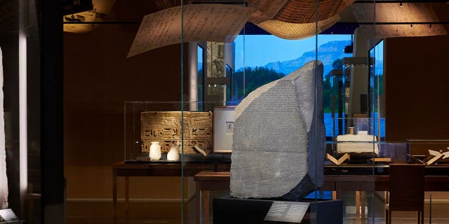 The Rosetta Stone is displayed as the centerpiece of a new exhibition at London’s largest museum titled, "Hieroglyphs unlocking ancient Egypt," at the British Museum.