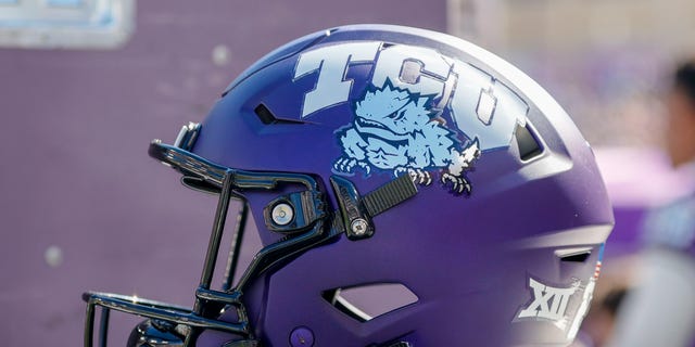 A TCU Horned Frogs helmet sits on an equipment box during the game between the TCU Horned Frogs and the Texas Tech Red Raiders on November 5, 2022 at Amon G. Carter Stadium in Fort Worth, Texas.