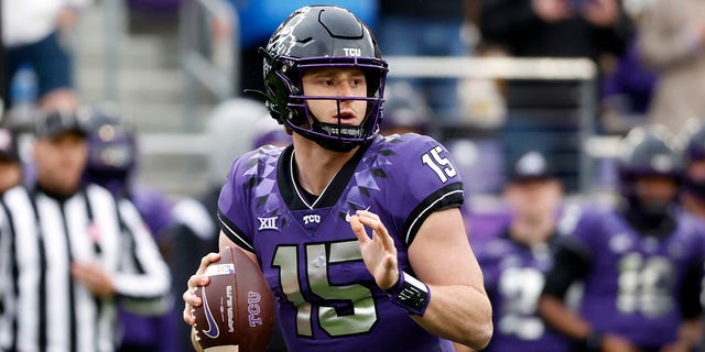 TCU Horned Frogs quarterback Max Duggan #15 looks to throw against the Iowa State Cyclones during the first half at Amon G. Carter Stadium on November 26, 2022 in Fort Worth, Texas. 