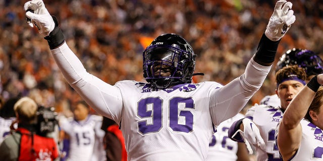 Lwal Uguak #96 of the TCU Horned Frogs celebrates after defeating the Texas Longhorns at Darrell K Royal-Texas Memorial Stadium on November 12, 2022 in Austin, Texas. 