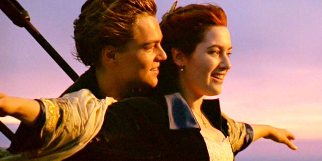 Leonardo DiCaprio with Kate Winslet with iconic Titanic ship pose