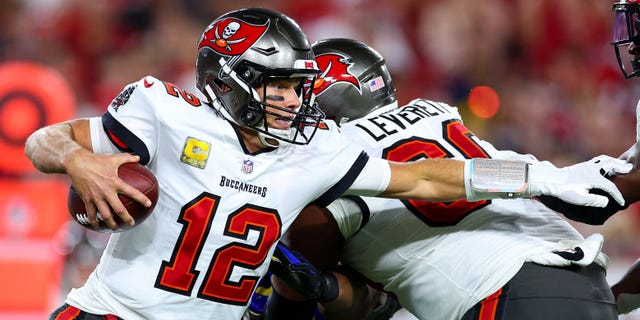 Tom Brady #12 of the Tampa Bay Buccaneers scrambles during the third quarter of a game against the Los Angeles Rams in the third quarter at Raymond James Stadium on November 06, 2022 in Tampa, Florida.