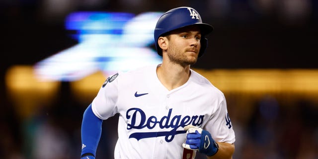 Trea Turner #6 of the Los Angeles Dodgers runs the bases after hitting a solo home run in the third inning in game two of the National League Division Series against the San Diego Padres at Dodger Stadium on October 12, 2022 in Los Angeles, California.