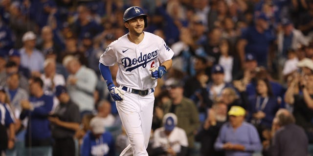 Trea Turner #6 of the Los Angeles Dodgers reacts to his solo home run in the third inning in game two of the National League Division Series against the San Diego Padres at Dodger Stadium on October 12, 2022 in Los Angeles, California.