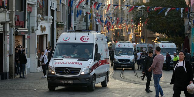 Security and ambulances on the scene after an explosion on Istanbul's popular pedestrianized Istiklal Avenue on Sunday, November 13, 2022. Istanbul Governor Ali Yerlikaya tweeted that the explosion occurred around 4:20 pm (1320 GMT) and that there were dead and wounded, but did not say how many.  The cause of the explosion was unclear. 