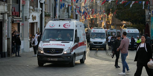 Security and ambulances on the scene after an explosion on Istanbul's popular pedestrianized Istiklal Avenue on Sunday, November 13, 2022. Istanbul Governor Ali Yerlikaya tweeted that the explosion occurred around 4:20 pm (1320 GMT) and that there were dead and wounded, but did not say how many.  The cause of the explosion was unclear. 