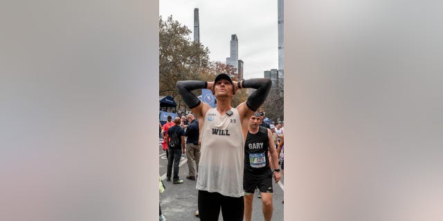 Will Wade, 30, crossed the finish line at the 2022 New York City Marathon to raise awareness about mental health issues. 