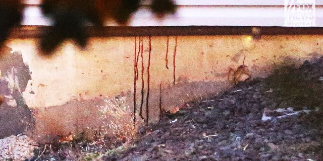 A view of the Moscow, Idaho, house taken on Nov. 16, 2022, where four students of the University of Idaho were murdered, shows red stains running down the foundation of the house.