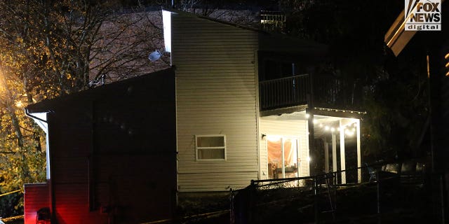 Exterior evening shot of the students' King Road rental home. Police say the suspect left through the read sliding door, visible on the right, after stabbing four undergrads on the home's second and third stories.