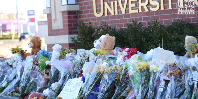 Flowers at an improvised memorial at the University of Idaho in Moscow, Idaho Monday, Nov. 21, 2022, for four of its students who were slain on Nov. 13.