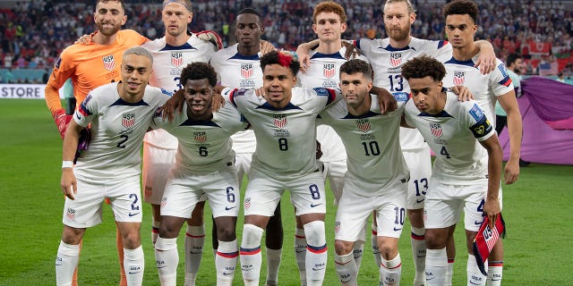 (Back row from L-R) Matt Turner, Walker Zimmermann, Timothy Weah, Joshua Sargent, Tim Ream, Antonee Robinson, (front row from L-R) Sergino Dest, Yunus Sargent, Weston McKennie, Christian Pulisic and Tyler Adams of USA line up for the team photo ahead of the FIFA World Cup Qatar 2022 Group B match between the USA and Wales at Ahmad Bin Ali Stadium on November 21, 2022, in Doha, Qatar.