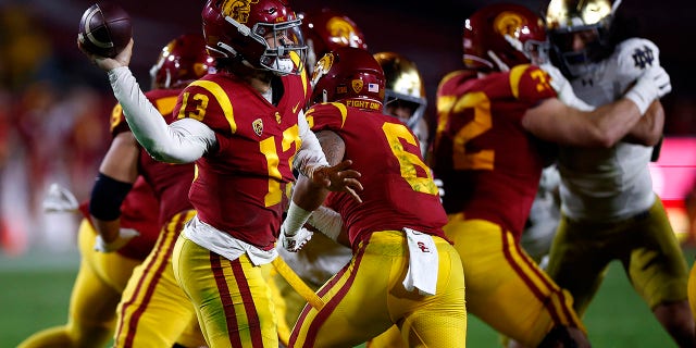 Caleb Williams #13 of the USC Trojans throws against the Notre Dame Fighting Irish in the first half at United Airlines Field at the Los Angeles Memorial Coliseum on November 26, 2022 in Los Angeles, California.