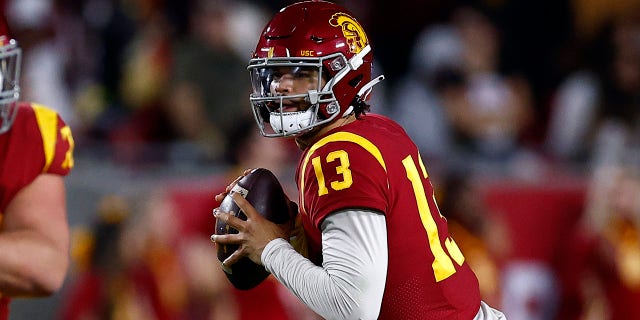 Caleb Williams #13 of the USC Trojans throws against the Notre Dame Fighting Irish in the first half at United Airlines Field at the Los Angeles Memorial Coliseum on November 26, 2022 in Los Angeles, California.