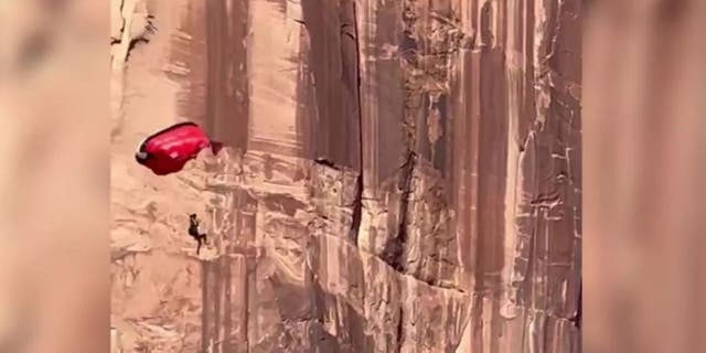 A Moab BASE jumper was rescued and airlifted to a hospital after a wind gust slammed him into a cliff