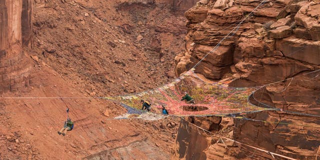 Utah BASE jumper slams into side of mountain, dangles in air after ...