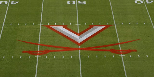 Virginia Cavaliers logo painted on field prior to a college football game between the Louisville Cardinals and the Virginia Cavaliers on October 08, 2022, at Scott Stadium in Charlottesville, VA. 