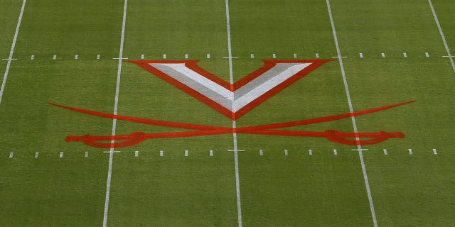 Virginia Cavaliers logo painted on field prior to a college football game between the Louisville Cardinals and the Virginia Cavaliers on October 08, 2022, at Scott Stadium in Charlottesville, VA. 